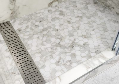 Custom Marble ite Base with Linear Drain